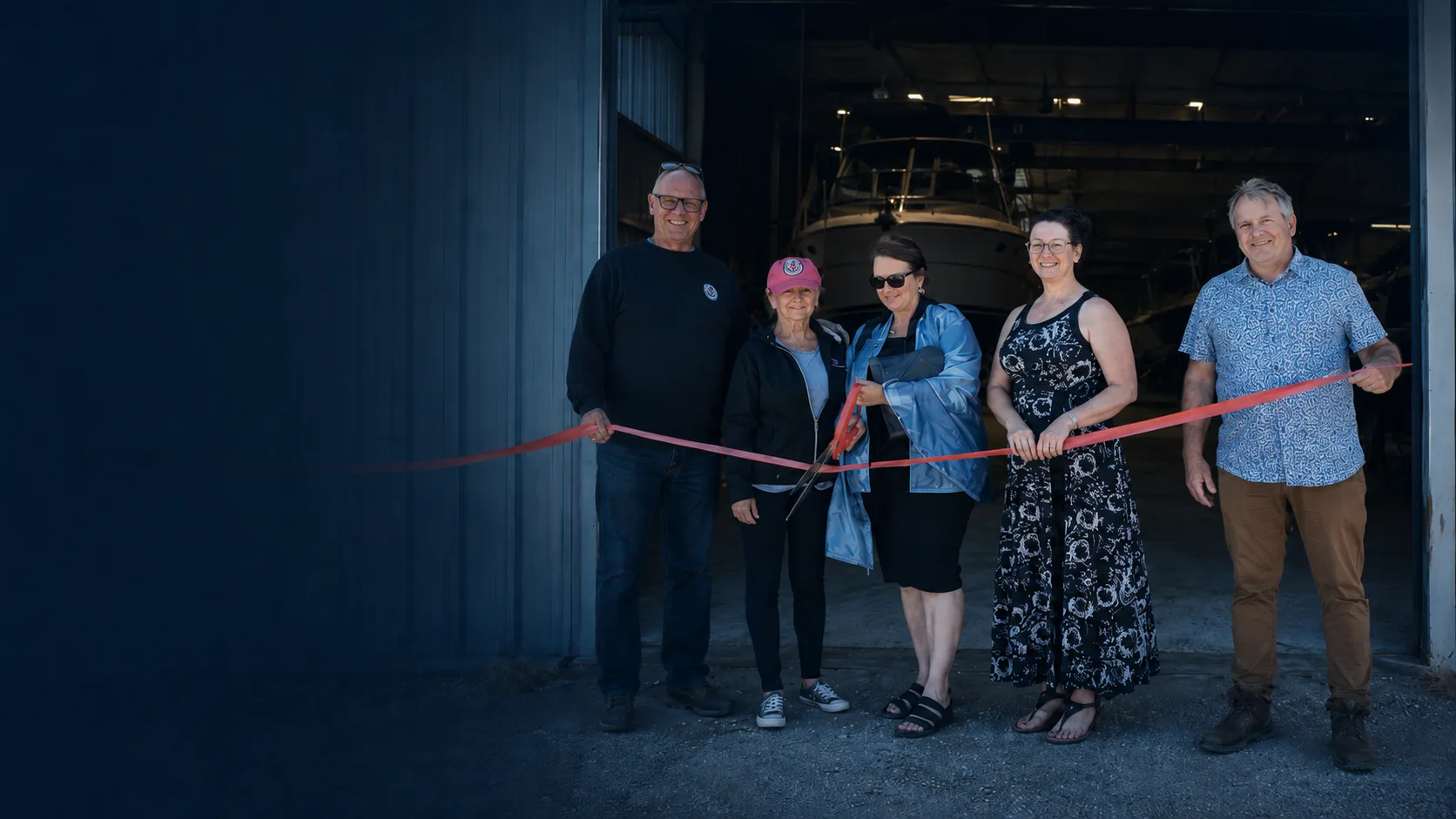 The Hartzel Marine team cutting the ribbon at the Dunnville shop's grand opening