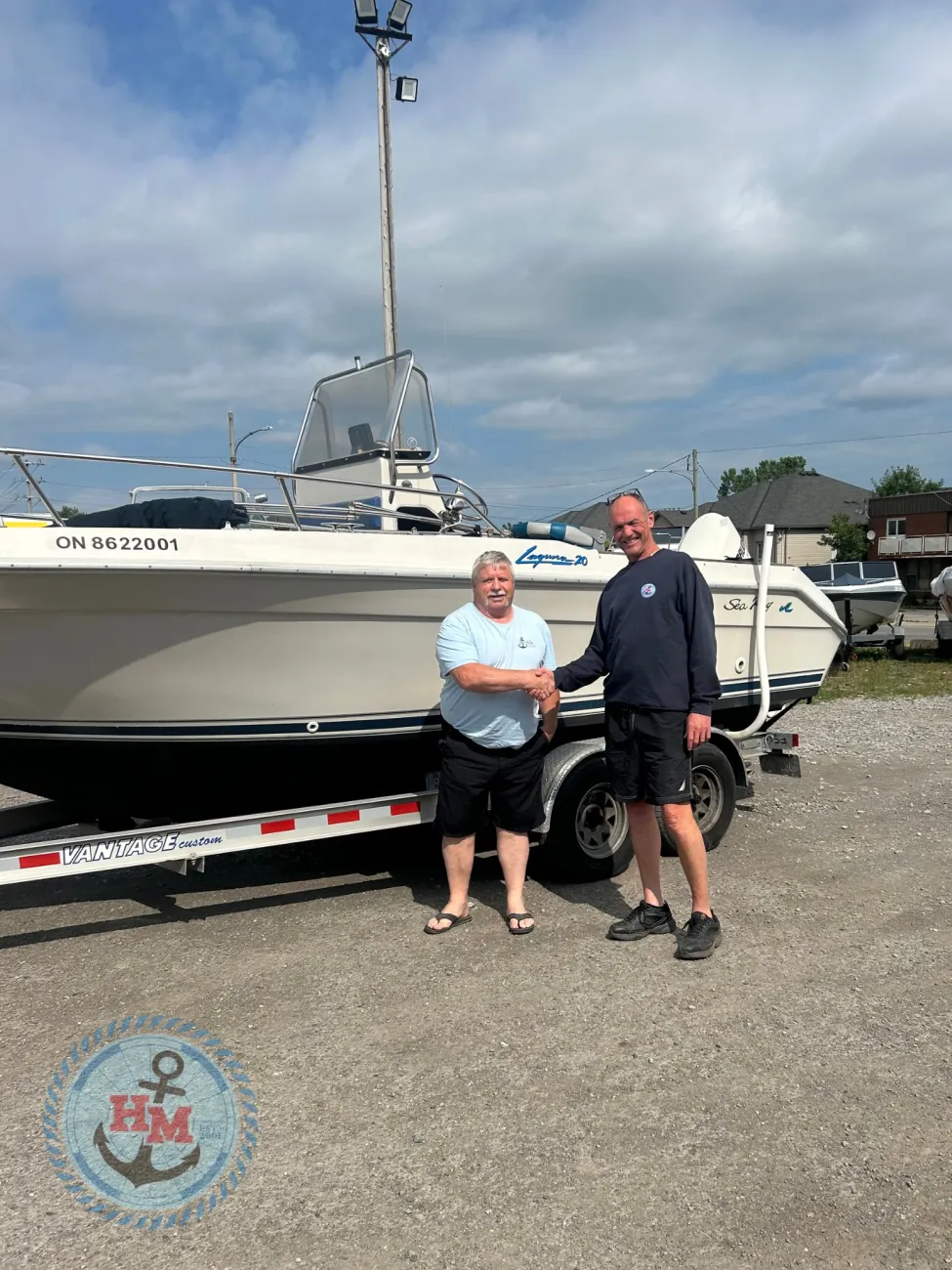 Happy customers picking up their boat from Hartzel Marine in Dunnville