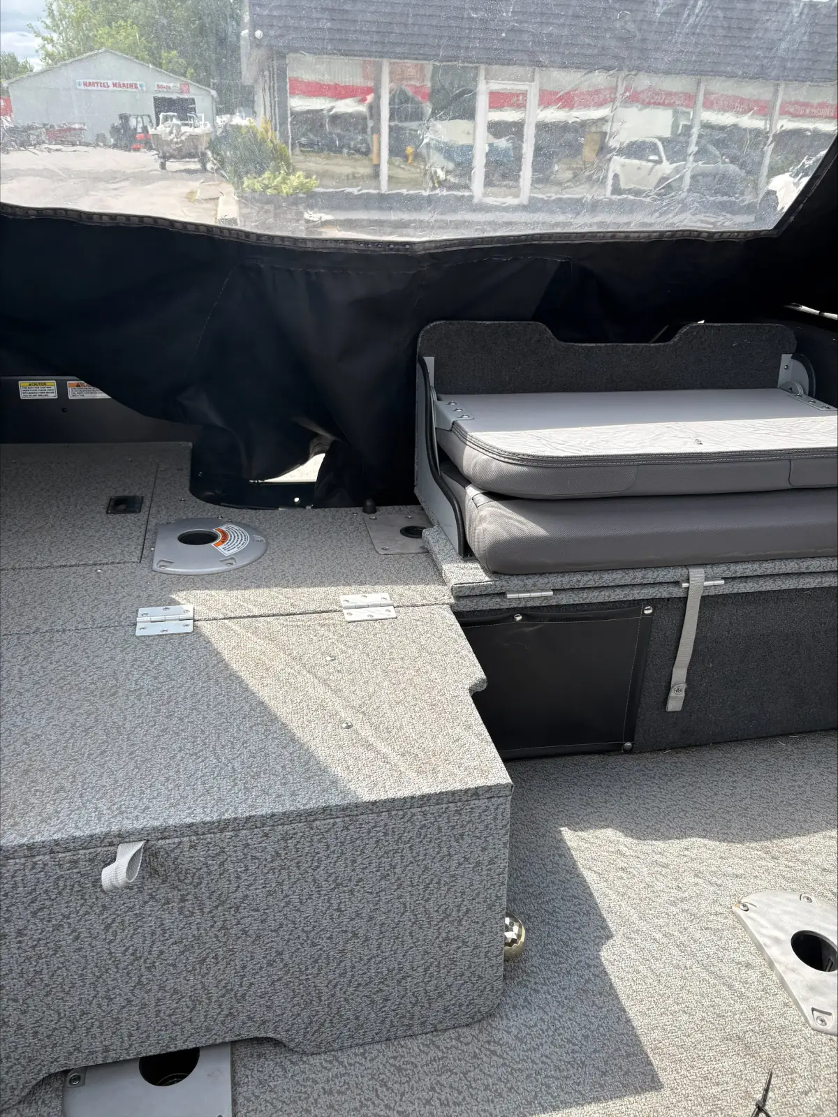 Casting deck and split bench seating inside the 2023 Legend XTE Sport 18