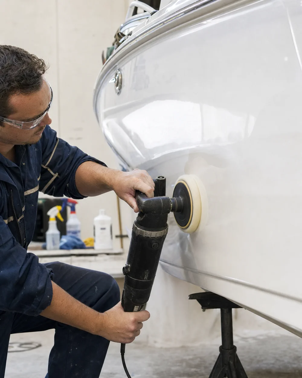 Gelcoat being polished on a fiberglass hull
