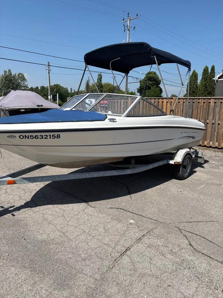 Side profile of the 2005 Bayliner 175 Bowrider on its trailer