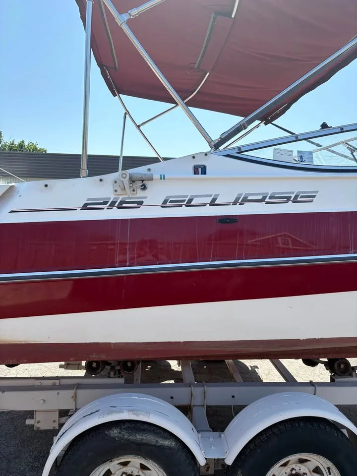 216 Eclipse hull graphics and bimini top on the Wellcraft 216