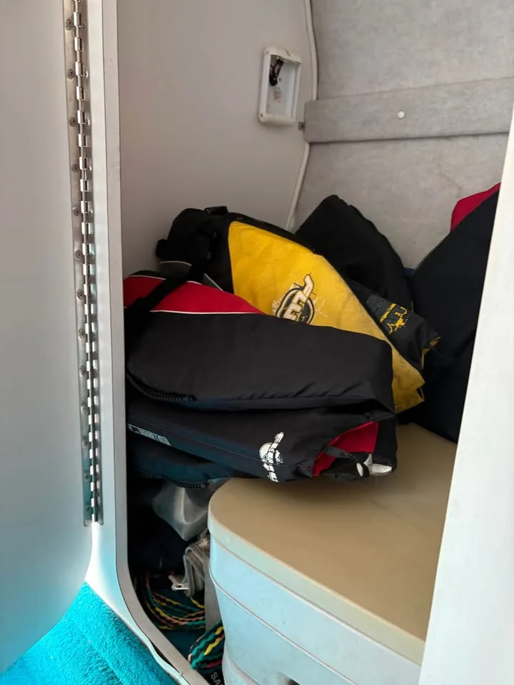 Cabin storage with life jackets aboard the Wellcraft 236 Eclipse